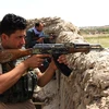 Lực lượng an ninh Afghanistan trong chiến dịch chống phiến quân tại Kunduz ngày 4/7. (Ảnh: THX/TTXVN)