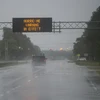 Mưa lớn do ảnh hưởng của bão Florence tại Wilmington, bang Bắc Carolina, Mỹ. (Ảnh: AFP/TTXVN)