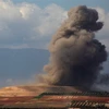 Khói bốc lên sau xung đột tại Kafr Ain, ngoại ô tỉnh Idlib, Syria ngày 7/9. (Ảnh: AFP/TTXVN)
