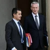 Bộ trưởng Kinh tế Bruno Le Maire (phải) và Bộ trưởng Ngân sách công Gérald Darmanin. (Nguồn: AFP)