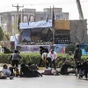 Hiện trường vụ tấn công nhằm vào lễ diễu binh ở thành phố Ahvaz, Iran ngày 22/9. (Ảnh: AFP/TTXVN)