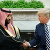 Tổng thống Mỹ Donald Trump (phải) và Thái tử Saudi Arabia Mohammad bin Salman trong cuộc gặp tại Washington DC., ngày 20/3/2018. (Ảnh: AFP/TTXVN)