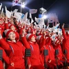 Các cổ động viên Triều Tiên tại Olympic PyeongChang, phía đông Seoul, Hàn Quốc ngày 9/2. (Nguồn: Yonhap/TTXVN)