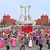 Người dân Triều Tiên múa hát tại một lễ kỷ niệm ở Bình Nhưỡng. (Nguồn: Yonhap/TTXVN)