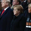 Từ phải qua trái: Tổng thống Nga Vladimir Putin, Phu nhân Tổng thống Pháp Brigitte Macron, Thủ tướng Đức Angela Merkel, Tổng thống Mỹ Donald Trump và vợ Melania Trump tại lễ kỷ niệm ngày 11/11 ở Paris. (Nguồn: AP)