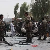Lực lượng an ninh gác tại hiện trường một vụ tấn công ở Lashkar Gah, thủ phủ tỉnh Helmand, Afghanistan. (Ảnh: THX/TTXVN)