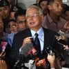  Cựu Thủ tướng Malaysia Najib Razak (giữa) trong cuộc họp báo sau phiên tòa ở Kuala Lumpur, ngày 20/9/2018. (Ảnh: THX/TTXVN)