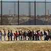 Người di cư Trung Mỹ chờ xin tị nạn vào Mỹ tại Ciudad Juarez, biên giới Mỹ-Mexico ngày 3/12/2018. (Ảnh: AFP/TTXVN)