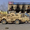 Lực lượng ủng hộ chính phủ Yemen tại khu vực ngoại ô Hodeida. (Ảnh: AFP/TTXVN)