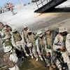 Lính thủy đánh bộ Mỹ trở về căn cứ quân sự ở Okinawa, Nhật Bản sau khi làm nhiệm vụ tại Iraq. (Nguồn: AFP/TTXVN)