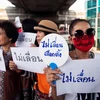 Tuần hành ở thủ đô Bangkok phản đối hoãn tổng tuyển cử hôm 6/1. (Ảnh: AFP/TTXVN)