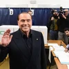 Cựu Thủ tướng Italy Silvio Berlusconi bỏ phiếu tại điểm bầu cử ở Milan hồi tháng 3/2018. (Nguồn: AFP/TTXVN)