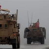 Đoàn xe quân sự Mỹ được triển khai tại thành phố Manbij, Syria, ngày 30/12/2018. (Ảnh: AFP/TTXVN)