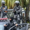 Lực lượng an ninh Brazil gác tại Rio de Janeiro. (Ảnh: AFP/TTXVN)