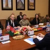 Quyền Bộ trưởng Quốc phòng Mỹ Patrick Shanahan (thứ 2, trái) trong cuộc gặp Cố vấn An ninh quốc gia Afghanistan Hamdullah Mohib (phải) tại Kabul ngày 11/2/2019. (Ảnh: AFP/TTXVN)