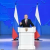Tổng thống Vladimir Putin đọc Thông điệp liên bang thường niên trước Hội đồng Liên bang Nga ở Moskva ngày 20/2. (Ảnh: AFP/TTXVN)