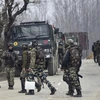 Binh sỹ Ấn Độ được triển khai tới hiện trường vụ xung đột với các tay súng phiến quân tại quận Pulwama thuộc khu vực Kashmir do Ấn Độ kiểm soát, ngày 18/2/2019. (Ảnh: AFP/TTXVN)