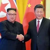 Chủ tịch Triều Tiên Kim Jong-un (trái) và Chủ tịch Trung Quốc Tập Cận Bình. (Nguồn: AFP)