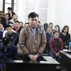Bị cáo Châu Việt Cường khai báo trước Tòa. (Ảnh: Kim Anh/TTXVN)