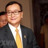 Ông Sam Rainsy tới dự phiên họp toàn thể Quốc hội Campuchia ở thủ đô Phnom Penh ngày 9/4/2015. (Nguồn: EPA/TTXVN)
