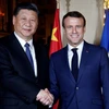 Tổng thống Pháp Emmanuel Macron và Chủ tịch Trung Quốc Tập Cận Bình. (Nguồn: AFP)