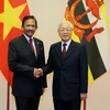 Tổng Bí thư, Chủ tịch nước Nguyễn Phú Trọng đón Quốc vương Brunei Hassanal Bolkiah. (Ảnh: Dương Giang/TTXVN)