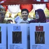 Cử tri bỏ phiếu tại điểm bầu cử ở Trumon, tỉnh Nam Aceh, Indonesia sáng 17/4/2019. (Ảnh: AFP/TTXVN)