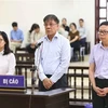 Các bị cáo Vũ Thị Ngọc Lan, Đỗ Văn Khạnh và Nguyễn Tuấn Hùng tại phiên tòa. (Ảnh: Doãn Tấn/TTXVN)
