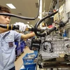 Xưởng lắp ráp động cơ xe máy Vespa tại Công ty TNHH Piaggio Việt Nam, khu công nghiệp Bình Xuyên, tỉnh Vĩnh Phúc. (Ảnh: Trần Việt/TTXVN)