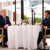 Tổng thống Pháp Emmanuel Macron và người đồng cấp Mỹ Donald Trump. (Nguồn: The New York Times)