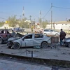 Hiện trường một vụ đánh bom xe ở Mosul, Iraq. (Ảnh: AFP/TTXVN)