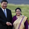 Chủ tịch Trung Quốc Tập Cận Bình tới Nepal và Tổng thống nước chủ nhà Bidhya Devi Bhandari. (Nguồn: AP)