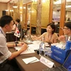 Doanh nghiệp hai nước Việt Nam-Hàn Quốc tìm hiểu cơ hội hợp tác, đầu tư. (Ảnh: Hứa Chung/TTXVN)
