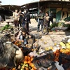 Hiện trường vụ đánh bom xe nhằm vào một khu chợ ở Syria. (Ảnh minh hoạ. AFP/TTXVN) 