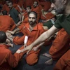 Các đối tượng được cho là thành viên Tổ chức Nhà nước Hồi giáo (IS) tự xưng tại một nhà tù ở thành phố Hasakeh, miền Đông Bắc Syria ngày 26/10/2019. (Ảnh: AFP/TTXVN)