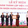 Chủ tịch Quốc hội Nguyễn Thị Kim Ngân trao Huân chương Hồ Chí Minh cho Viện Khoa học Thủy lợi Việt Nam. (Ảnh: Trọng Đức/TTXVN)