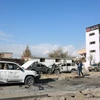 Nhân viên an ninh Afghanistan điều tra tại hiện trường một vụ đánh bom do phiến quân Taliban tiến hành ở Kabul ngày 13/11/2019. (Ảnh: THX/TTXVN)
