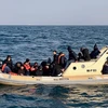 Người di cư trái phép vào châu Âu. (Ảnh: AFP/TTXVN)