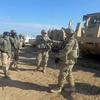 Binh sỹ Mỹ làm nhiệm vụ huấn luyện cho lực lượng Iraq tại căn cứ quân sự Basmaya, phía Đông Nam thủ đô Baghdad. (Ảnh: AFP/TTXVN)