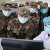 Các nhân viên y tế được điều động tới điều trị cho các bệnh nhân tại bệnh viện ở Vũ Hán, Trung Quốc, ngày 31/1/2020. (Ảnh: THX/TTXVN)