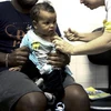 Tiêm vắcxin cho trẻ em tại Sao Paulo, Brazil. (Ảnh: AFP/TTXVN)