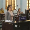Bị cáo Lê Thị Tường Vân tại phiên tòa xét xử. (Ảnh: Dư Toán/TTXVN)
