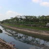 Một khúc sông Tô Lịch trong ngày khởi công. (Ảnh Mạnh Khánh/TTXVN)