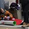 Người vô gia cư trên một đường phố ở Buenos Aires,Argentina. (Ảnh: AFP/TTXVN)