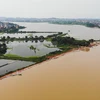 Nước sông tràn bờ do mưa lớn tại tỉnh Giang Tây, Trung Quốc. (Ảnh: THX/TTXVN)