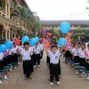 Học sinh lớp 1 của Trường Song ngữ Lào-Việt Nguyễn Du. (Ảnh: Phạm Kiên/TTXVN)