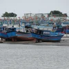 Luồng vào cảng cá Cà Ná bị bồi lấp gây khó khăn cho tàu thuyền ra vào. (Ảnh: Nguyễn Thành/TTXVN)