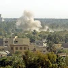 Khói bốc lên sau một vụ tấn công nhằm vào khu vực vùng Xanh ở thủ đô Baghdad, Iraq. (Ảnh: AFP/TTXVN)