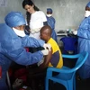 Tiêm chủng vắcxin phòng Ebola tại Goma, Cộng hòa Dân chủ Congo. (Ảnh: AFP/TTXVN)