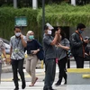 Người dân đeo khẩu trang phòng lây nhiễm COVID-19 tại Jakarta, Indonesia. (Ảnh: THX/ TTXVN)